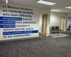 writing n wall -"At Marburn Academy, we celebrate students who learn differently.empowering them to awaken. their potential to achieve success in school and life, and to drive positive change in our communities